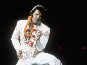 Elvis on one knee