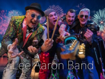Lee Aaron Band with firework display backdrop