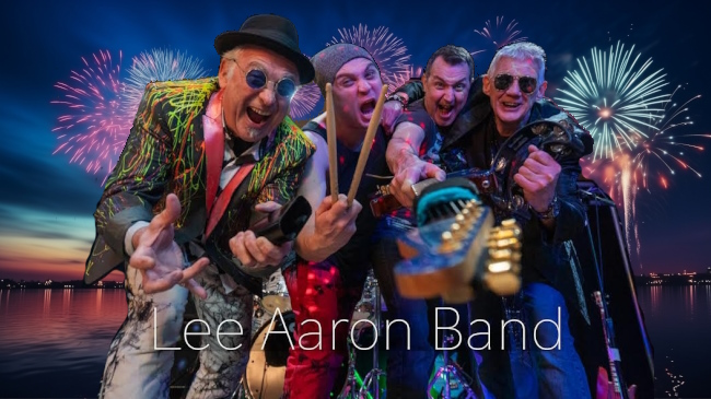 Lee Aaron Band with firework display backdrop