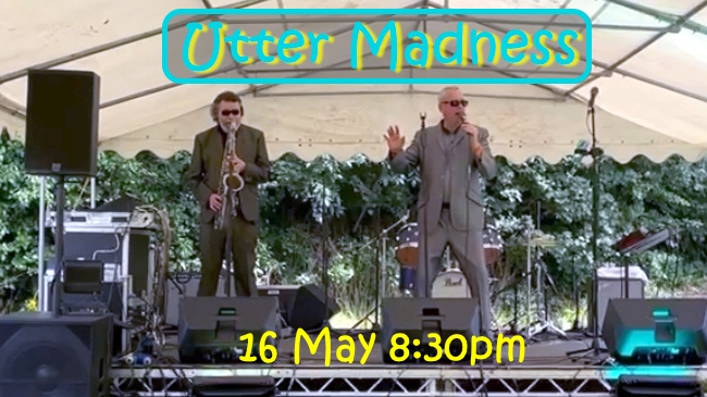 Two-man band on stage; one Saxaphone and one singer.