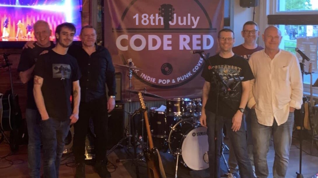 The 6 members of Code Red band posing either side of their instruments who are at the Club 18th July 2026